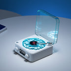 Modern record player with a transparent cover on a light gray surface.