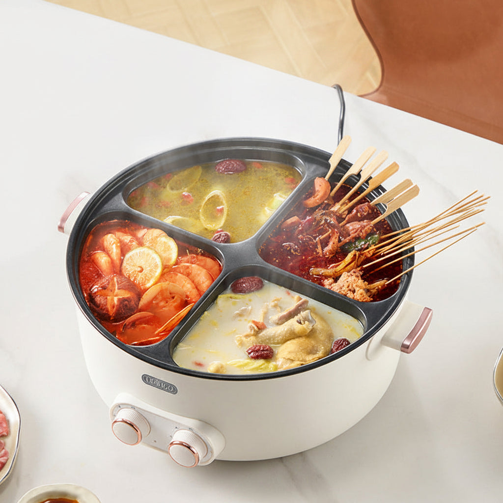 Multicolored hot pot with ingredients and skewers on a white surface