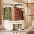 Container with compartments filled with green, brown, and beige beans on a marble surface.