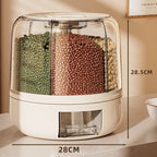 Container with compartments filled with green, brown, and beige beans on a marble surface.