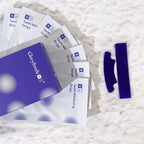 Teeth whitening strips with packaging on a textured surface