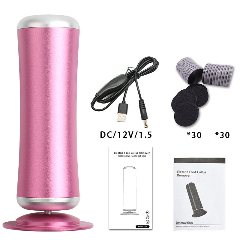 Pink electric foot callus remover with accessories on a white background