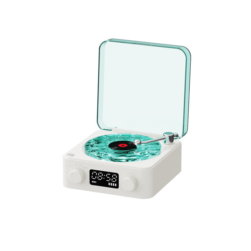 Small Vinyl Wireless Bluetooth Speaker with a digital display on a white background