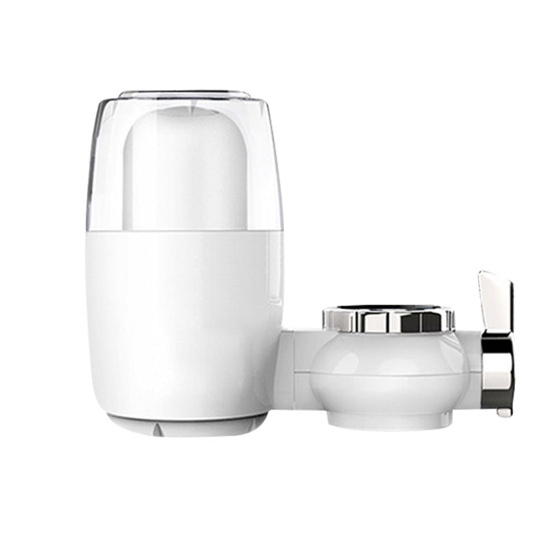 White and chrome bathroom faucet and dispenser on a white background